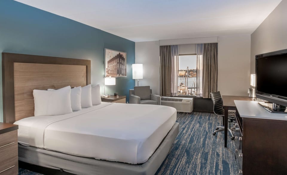 Premium bedding, down comforters, pillowtop beds, in-room safe