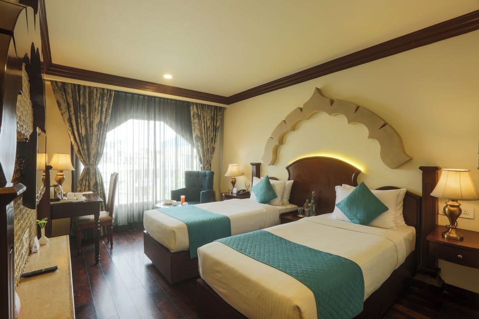 Royal Deluxe | Premium bedding, minibar, in-room safe, desk