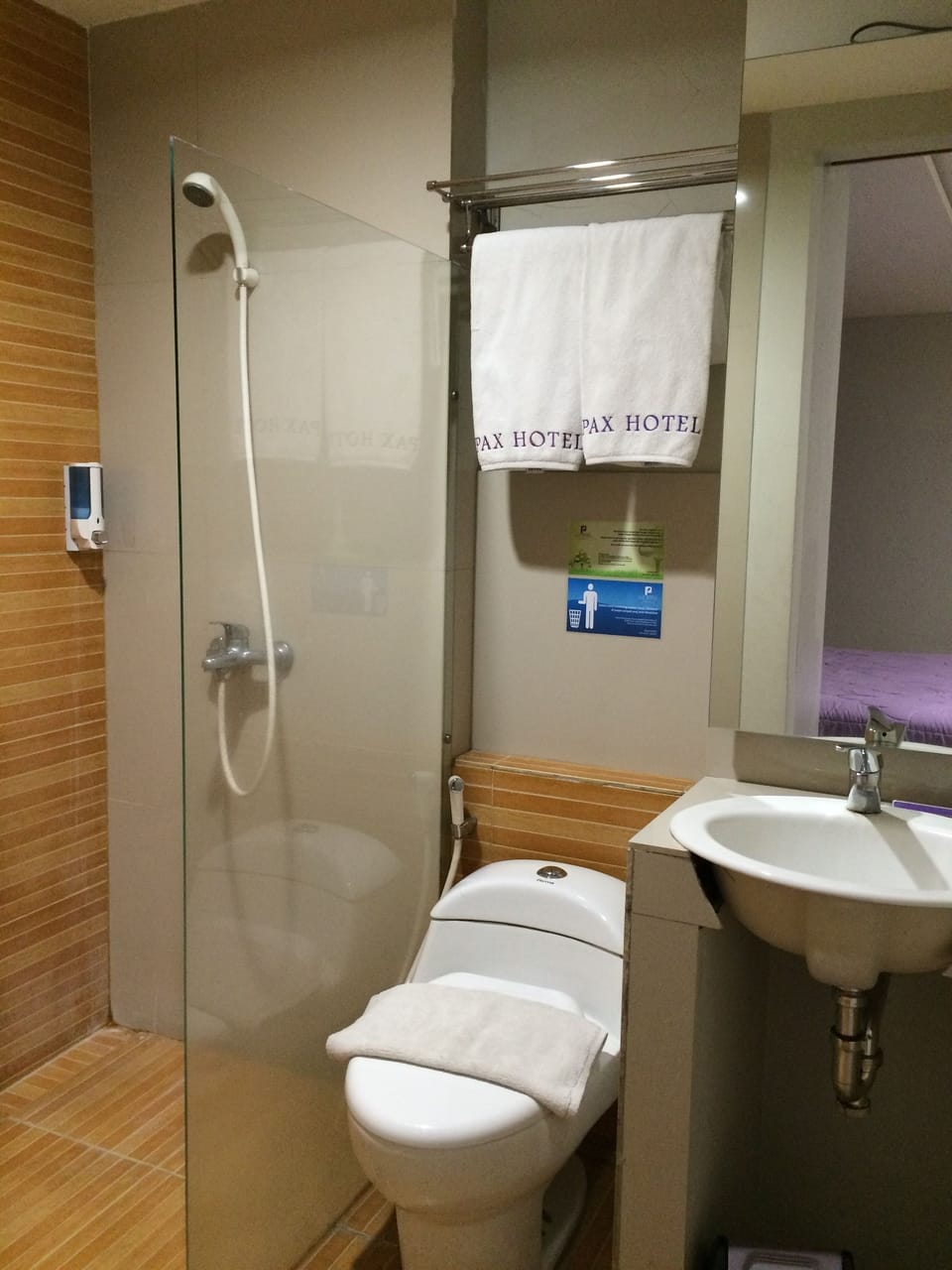 Shower, free toiletries, slippers, towels
