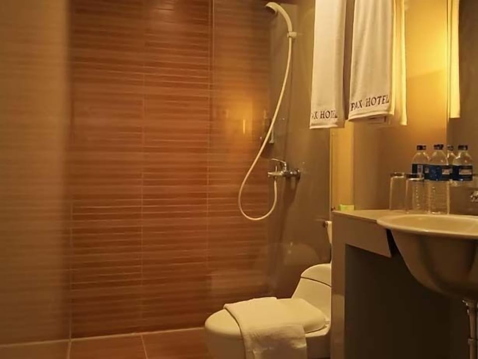 Shower, free toiletries, slippers, towels