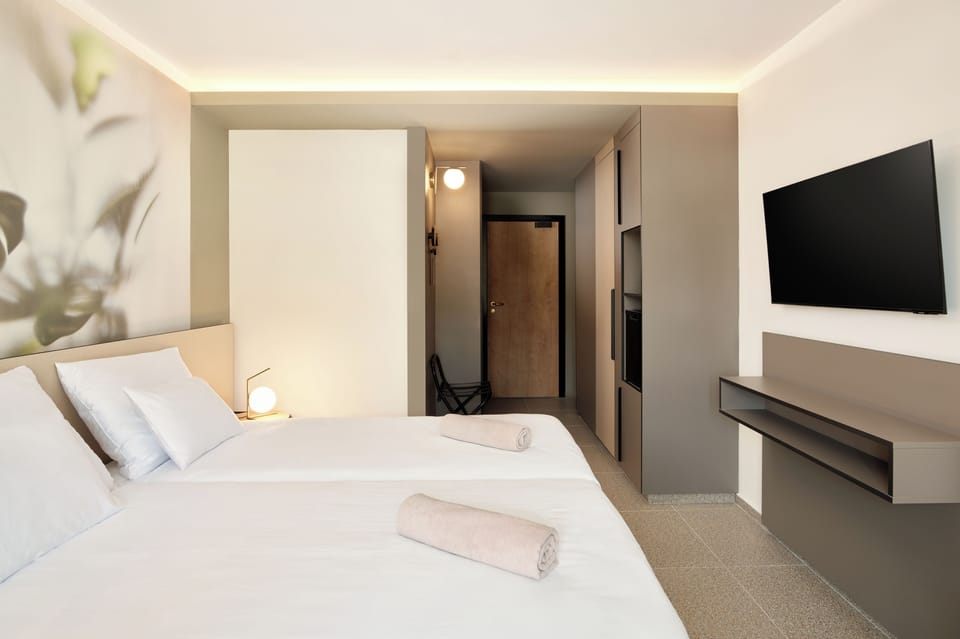 Connecting Room, Balcony, Partial Sea View | In-room safe, desk, blackout drapes, free cribs/infant beds