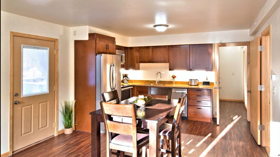 Romantic 1- Bedroom Condo with Full Kitchen | Private kitchen | Full-size fridge, microwave, oven, stovetop