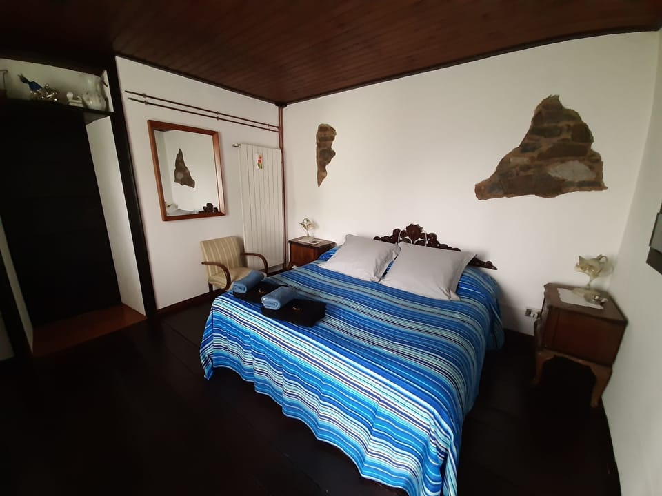 Double Room, Private Bathroom (Mughetto) | Individually decorated, individually furnished, blackout drapes