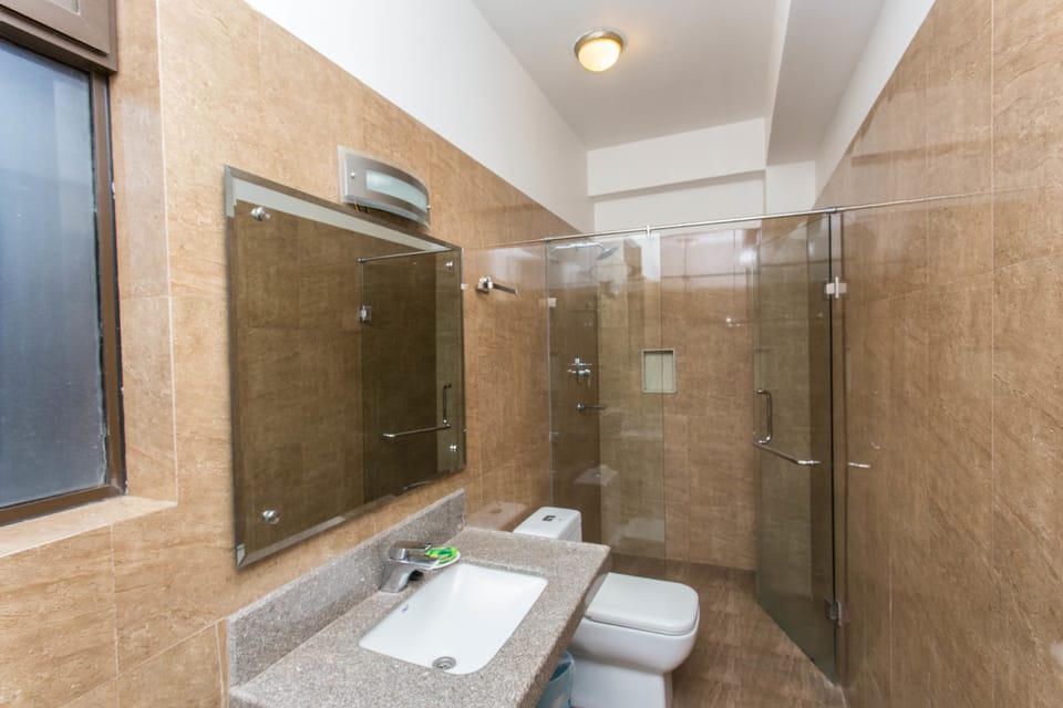 Shower, free toiletries, hair dryer, slippers