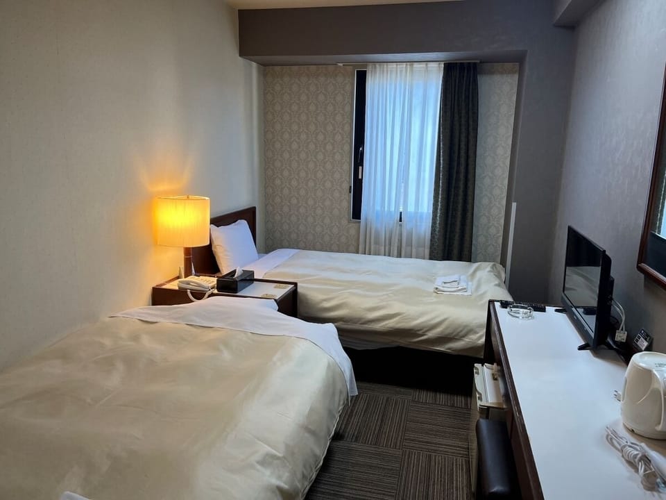 Desk, WiFi (free), bed sheets