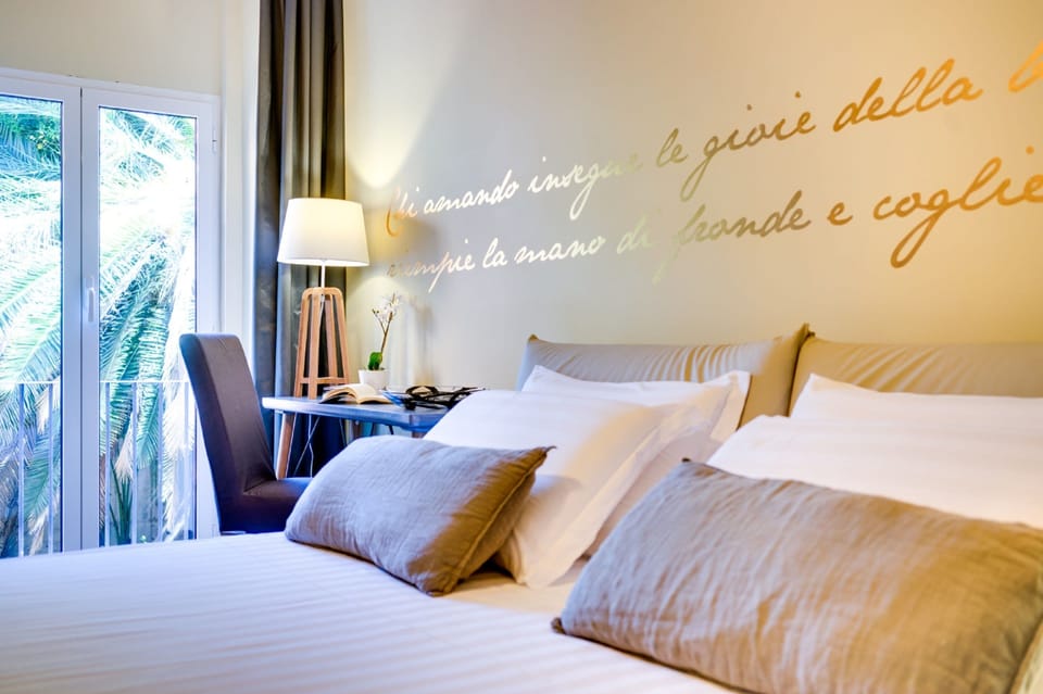 Deluxe Double Room, Private Bathroom (Suite Bernini) | Premium bedding, minibar, in-room safe, blackout drapes
