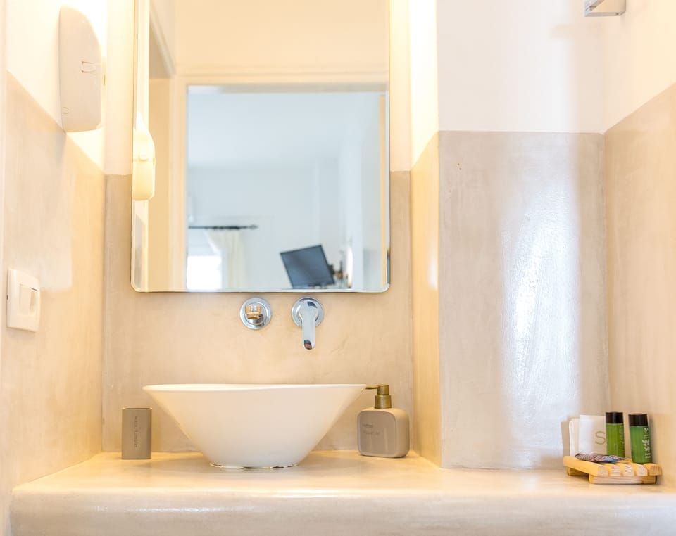 Standard Apartment, 1 Bedroom, Garden View | Bathroom | Shower, hair dryer, slippers, towels