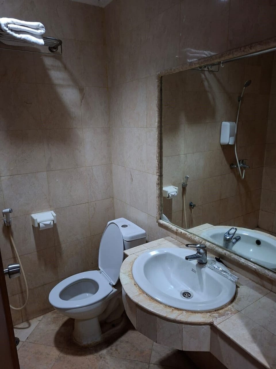 Separate tub and shower, soap, shampoo, toilet paper