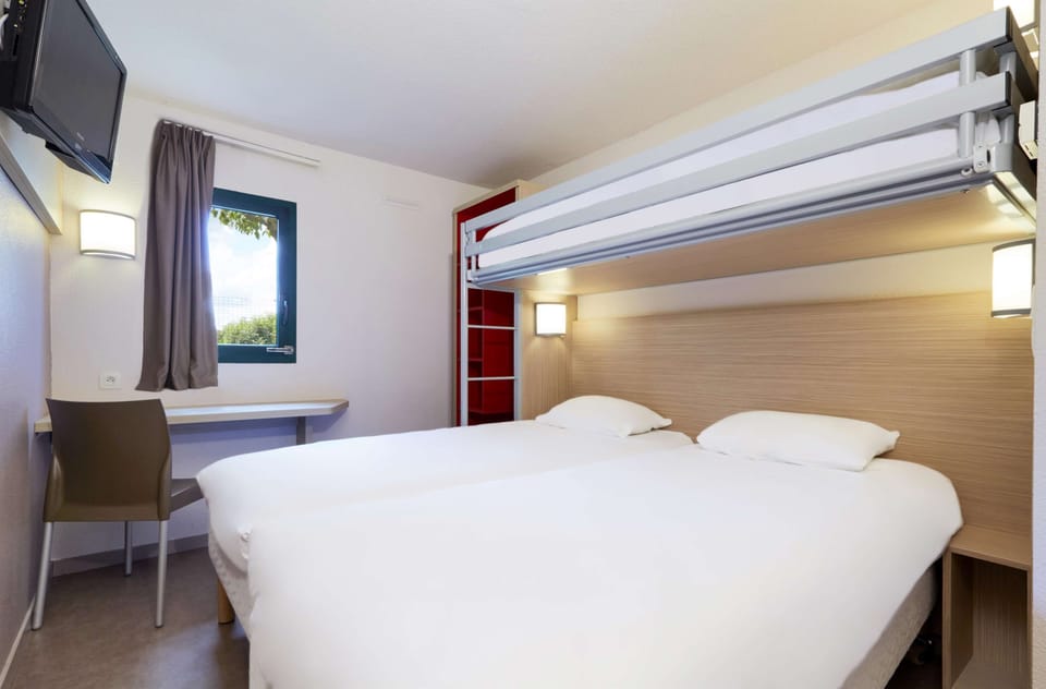 Premium bedding, individually furnished, desk, blackout drapes