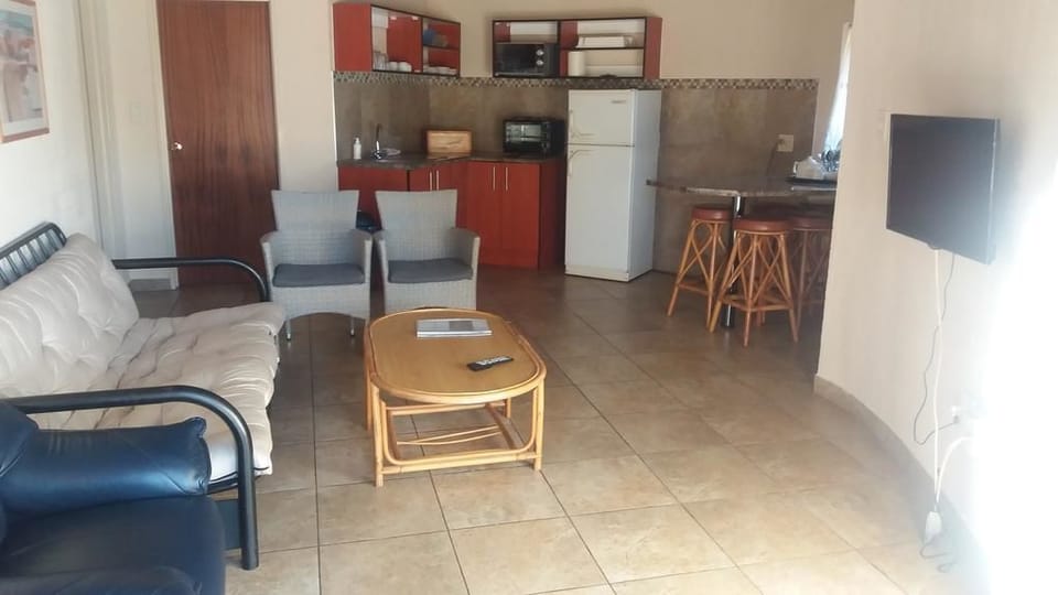 Two Bedroom Luxury  | Living room | 32-inch TV with satellite channels