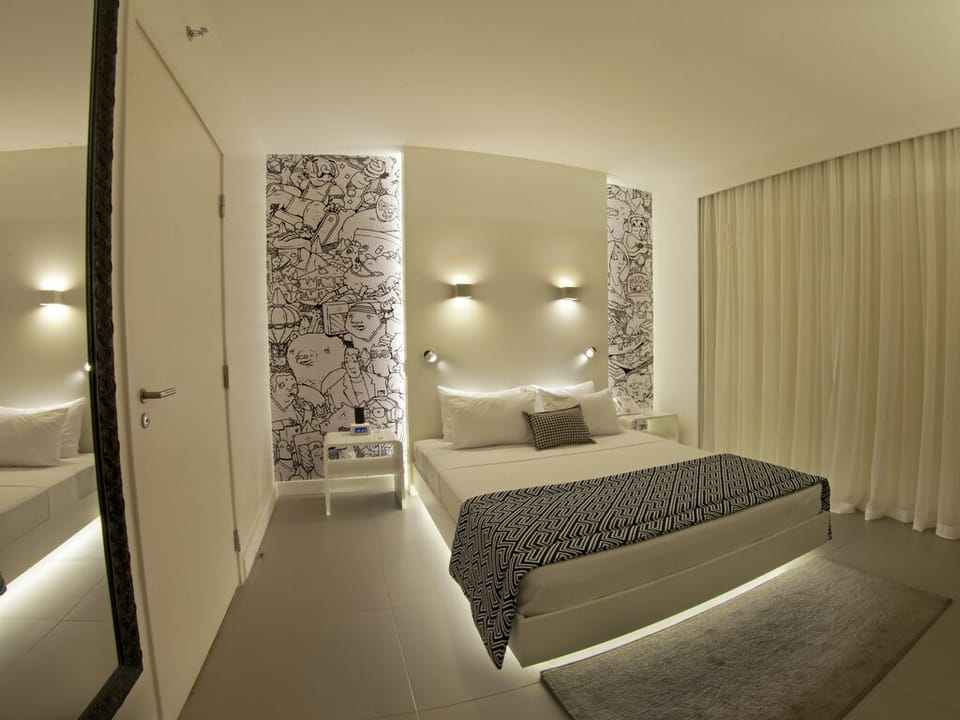 Standard Double Room | Minibar, in-room safe, desk, blackout drapes