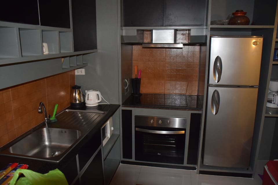 2 Bedrooms Apartment | Private kitchen | Full-size fridge, microwave, stovetop, electric kettle