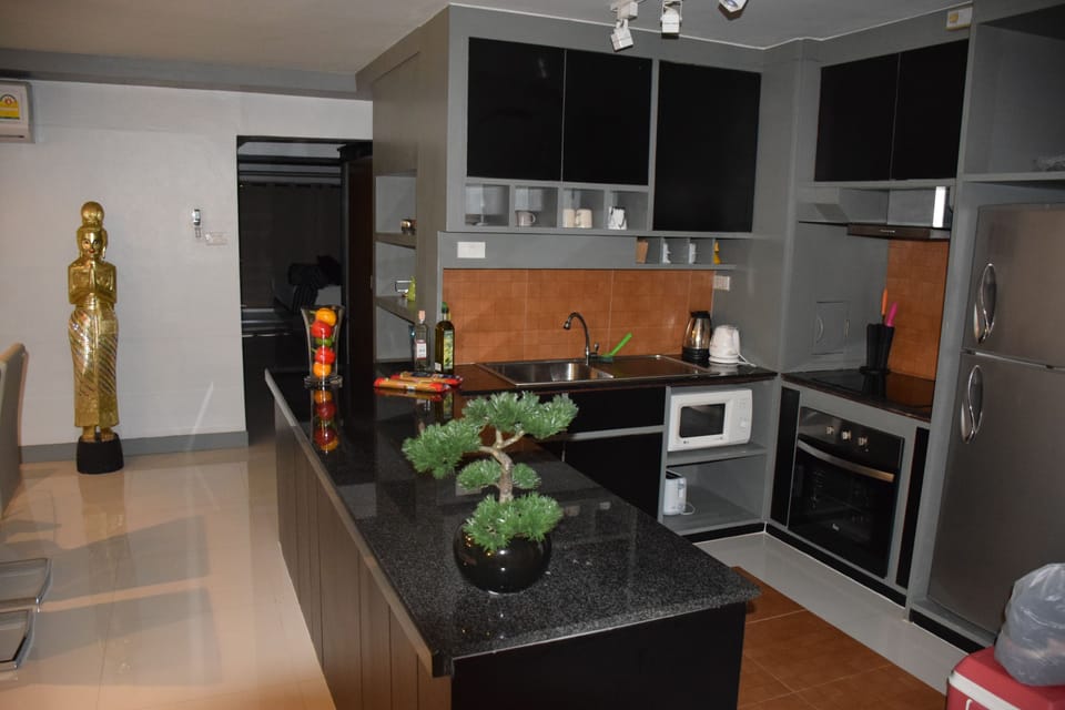 2 Bedrooms Apartment | Private kitchen | Full-size fridge, microwave, stovetop, electric kettle