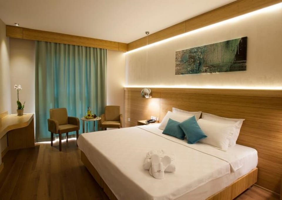 Premium bedding, desk, laptop workspace, soundproofing