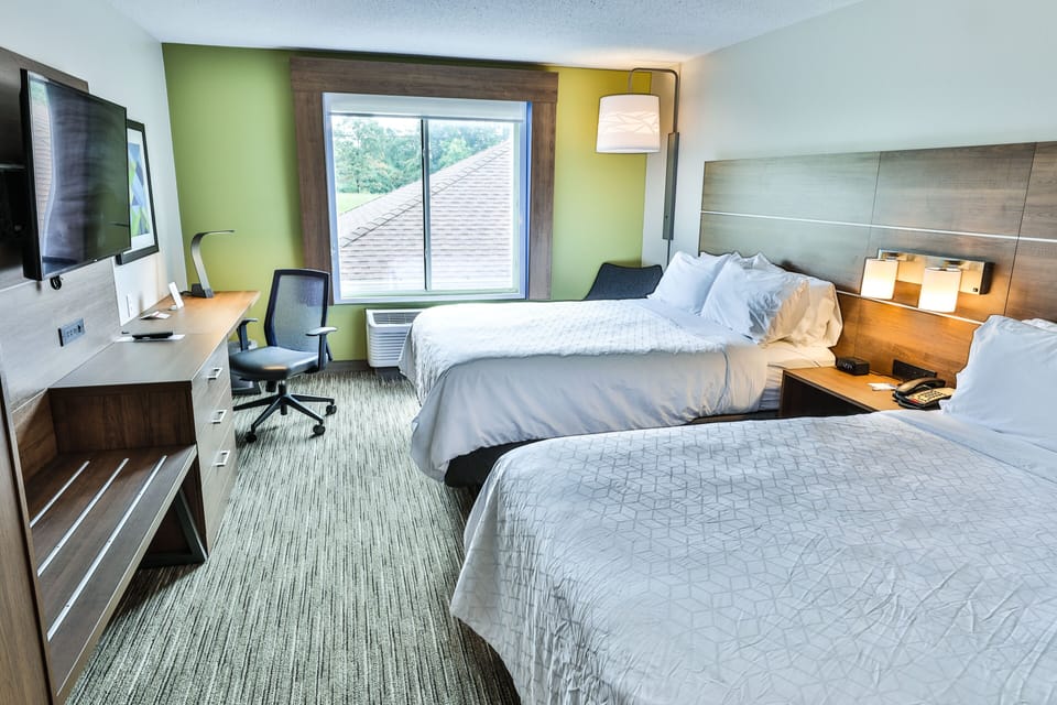 In-room safe, desk, iron/ironing board, cribs (free)