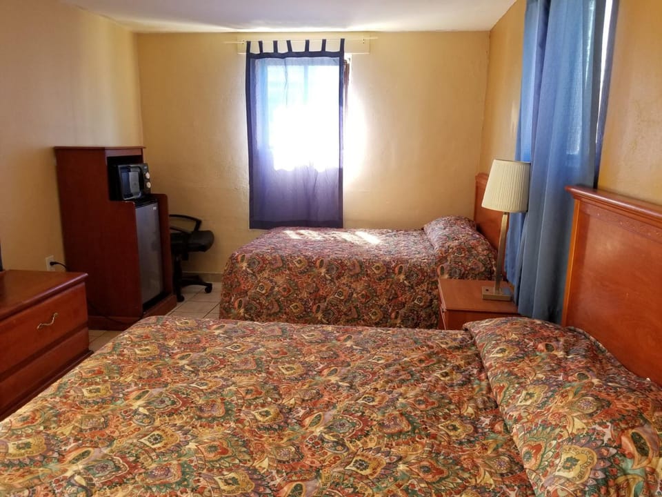 Desk, blackout drapes, iron/ironing board, free WiFi