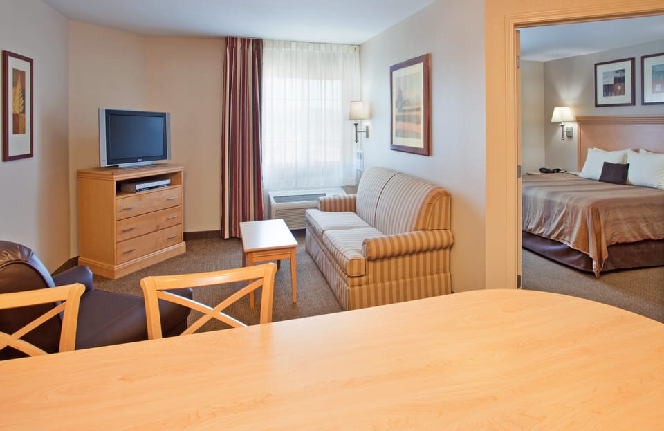 In-room safe, desk, iron/ironing board, cribs (free)