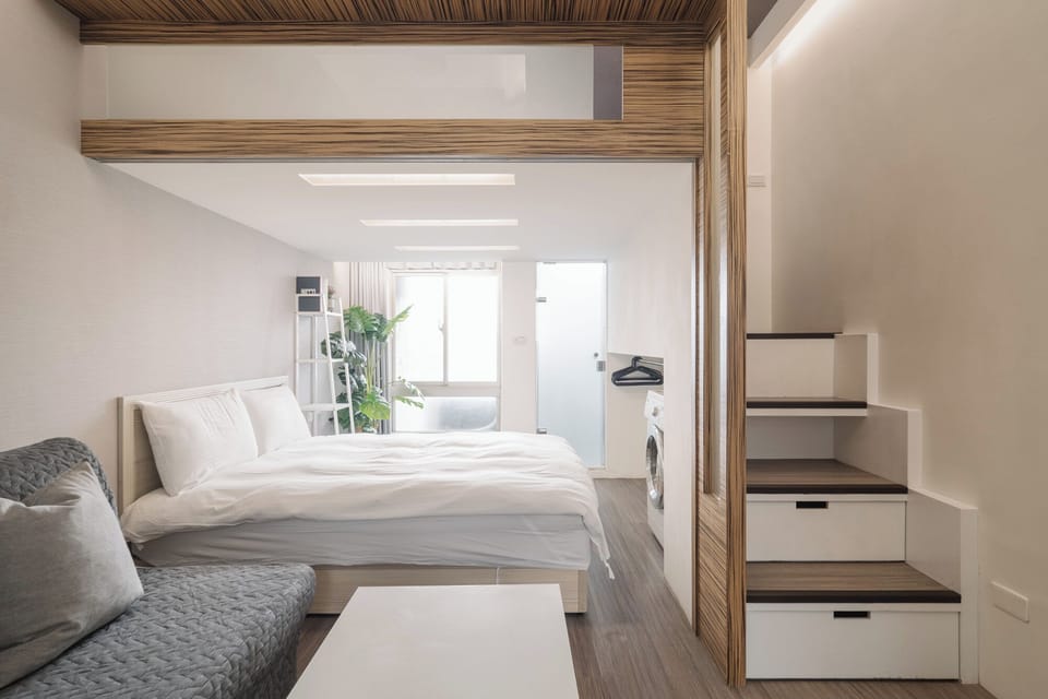 Signature Twin Room, 2 Double Beds | Living area | 32-inch LED TV with cable channels, TV
