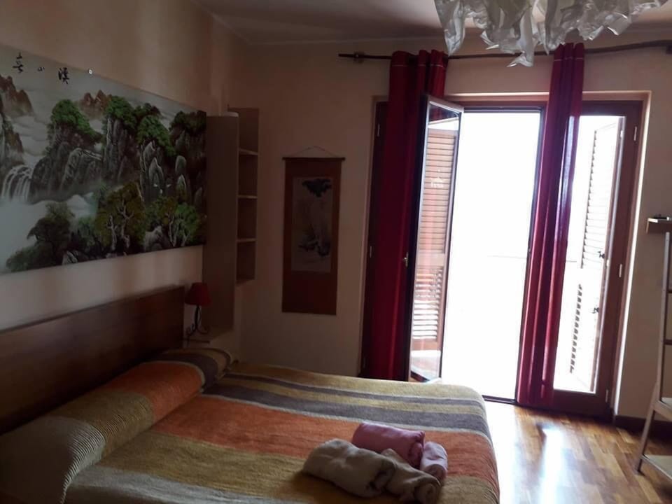 Economy Triple Room, Shared Bathroom | Desk, iron/ironing board, free WiFi