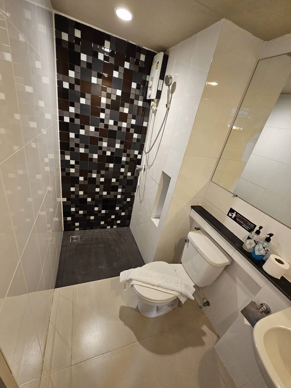 Shower, free toiletries, towels, soap