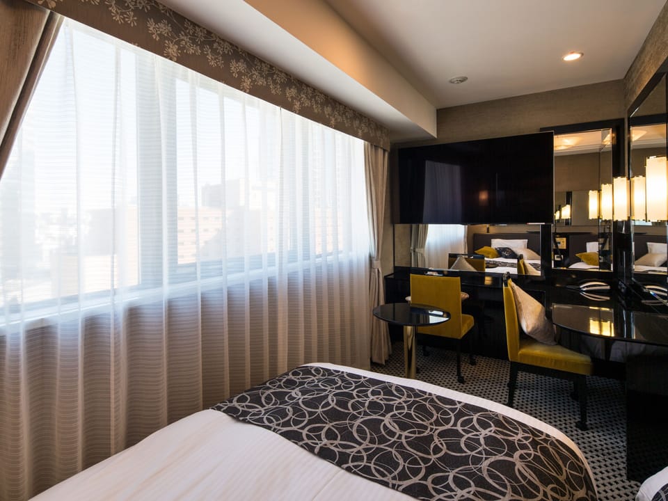 Deluxe Twin Room, Non Smoking | Premium bedding, down comforters, desk, blackout drapes
