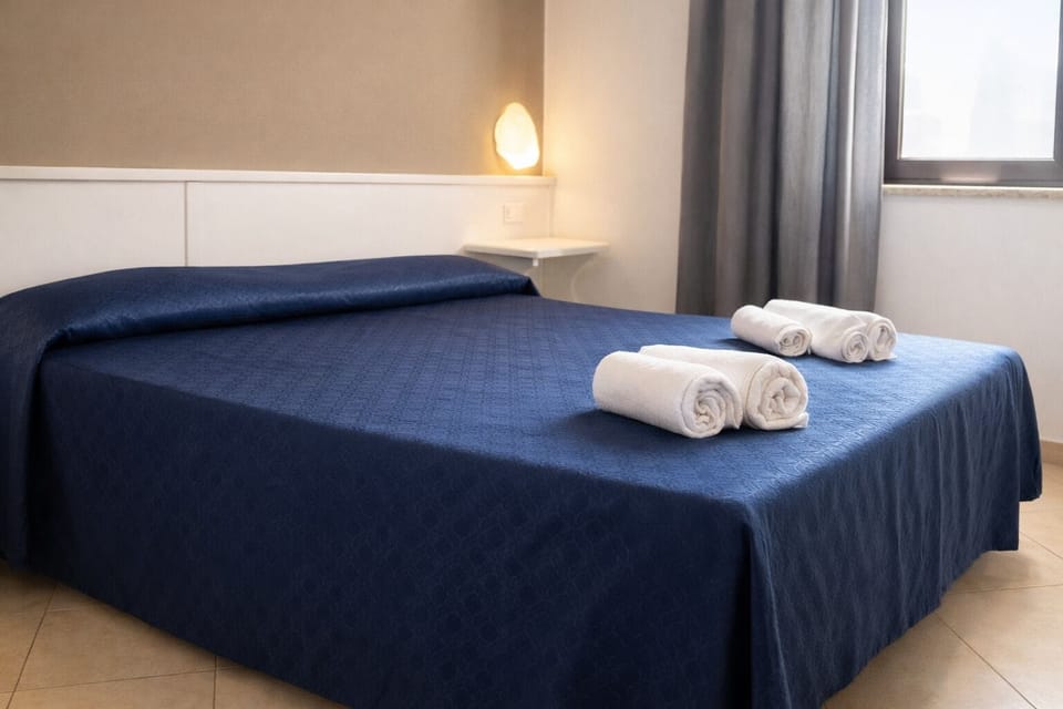 Double or Twin Room | Desk, cribs/infant beds, bed sheets
