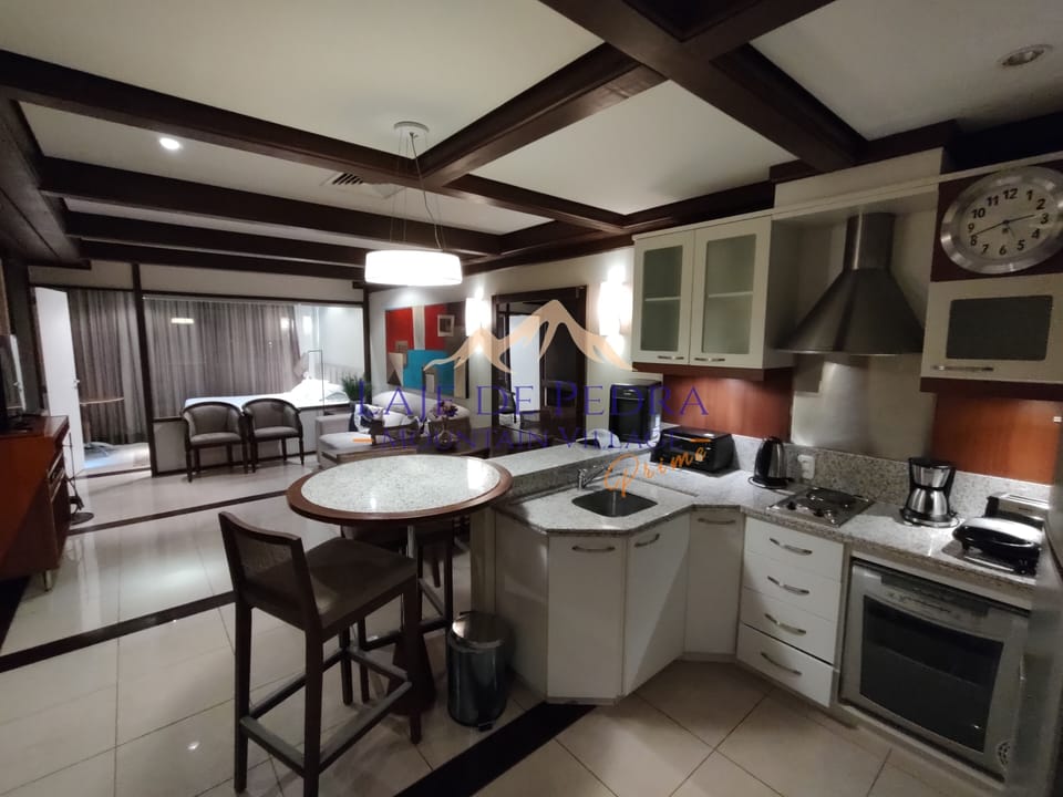 Suite Royal Prime | Private kitchen | Fridge, microwave, stovetop, coffee/tea maker