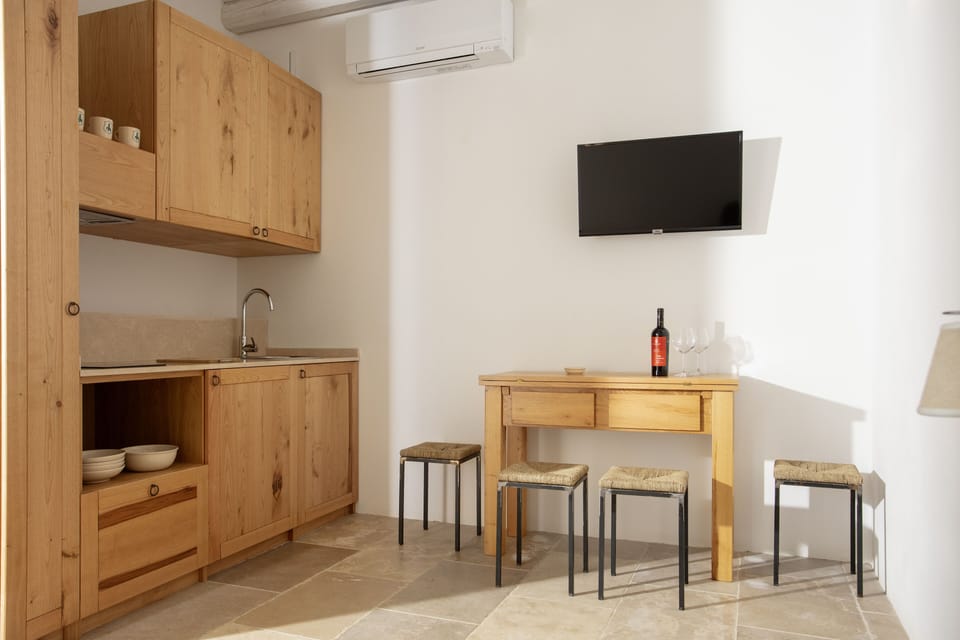 Superior Suite | Living area | Flat-screen TV