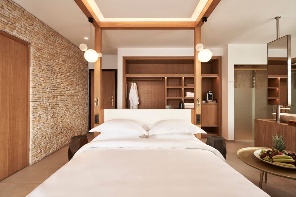 Naia Suite with Sea view & Outdoor Hot Tub | Premium bedding, pillowtop beds, minibar, in-room safe