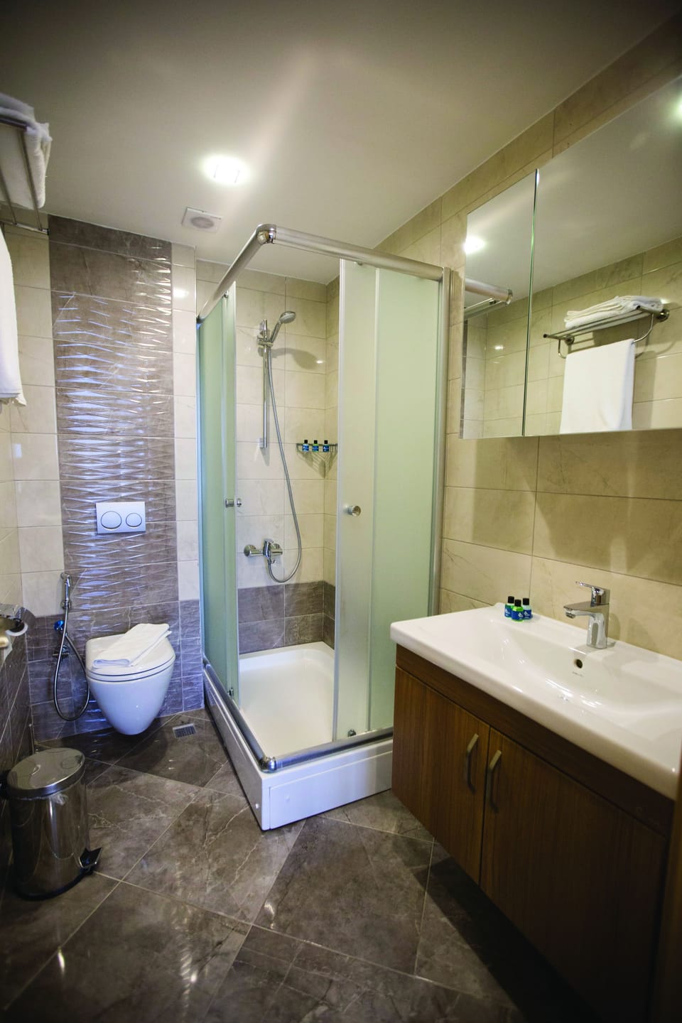Shower, free toiletries, hair dryer, slippers