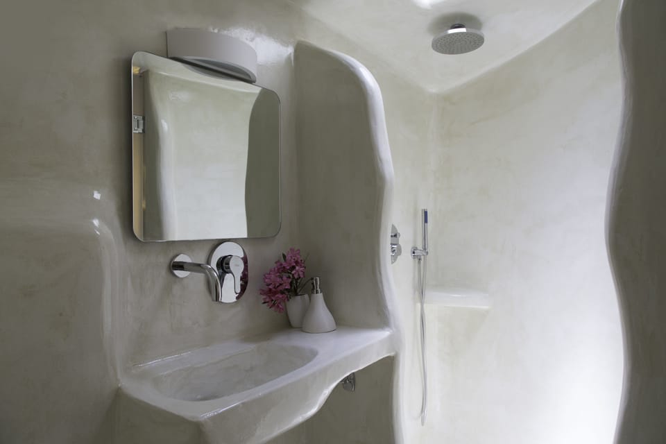 Shower, eco-friendly toiletries, hair dryer, towels