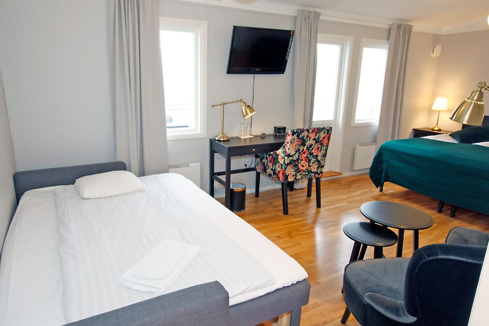 Family Room | Desk, iron/ironing board, free cribs/infant beds, free WiFi