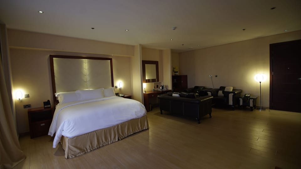 Deluxe Suite | Premium bedding, in-room safe, desk, laptop workspace