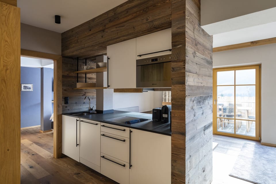 Deluxe Apartment, 2 Bedrooms (Lodge I, incl. Cleaning fee) | Private kitchen | Fridge, microwave, stovetop, dishwasher