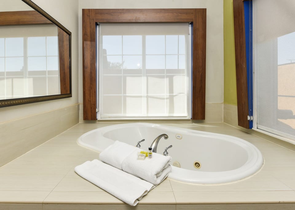 Premium bedding, pillowtop beds, in-room safe, blackout drapes