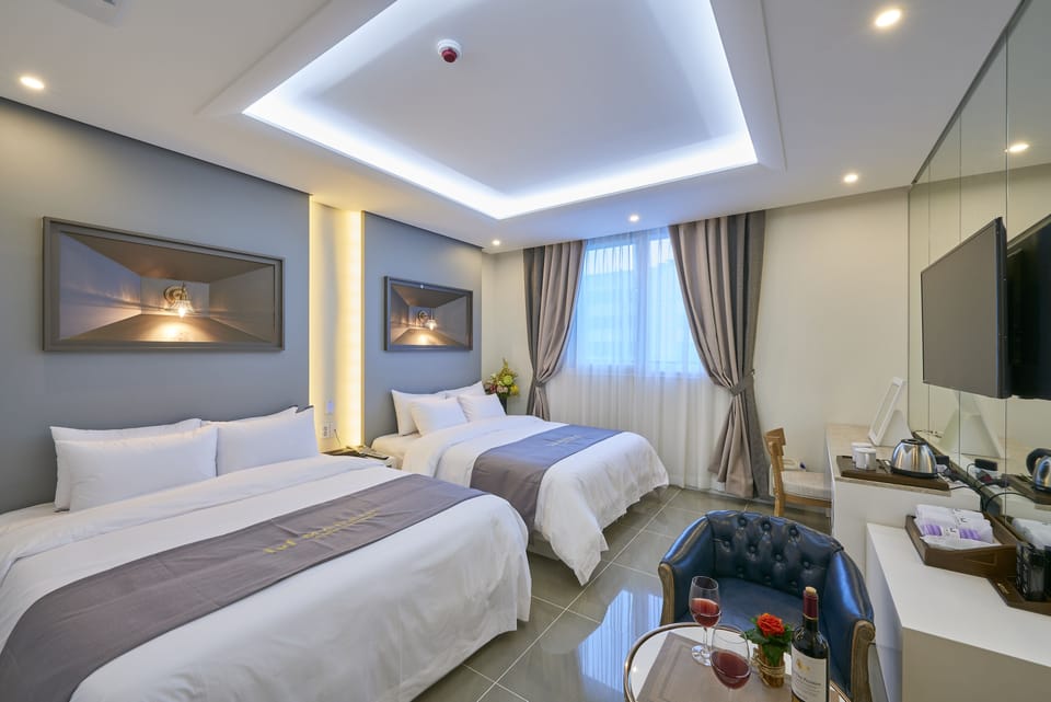 Standard Twin Room | Laptop workspace, blackout drapes, iron/ironing board, free WiFi
