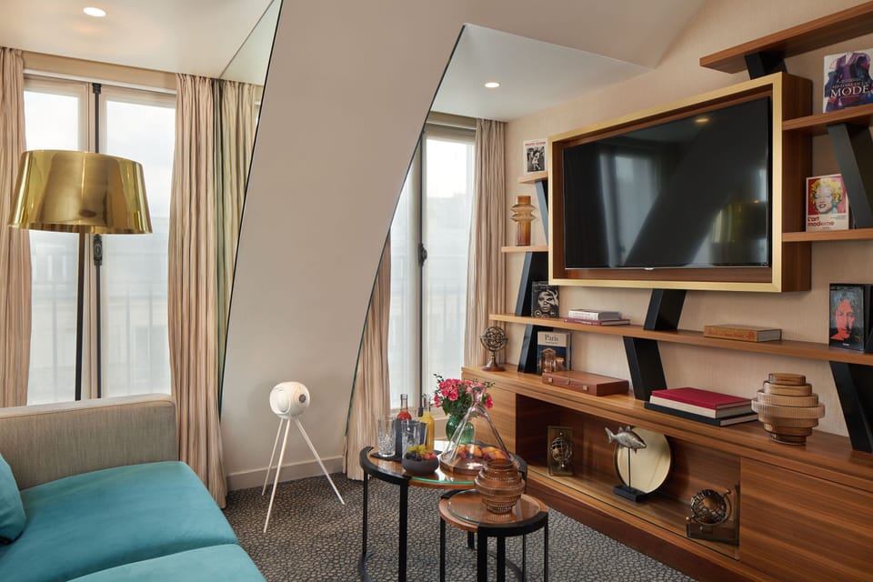 Pont-Neuf Suite  | Living area | 32-inch LCD TV with satellite channels, TV, tablet