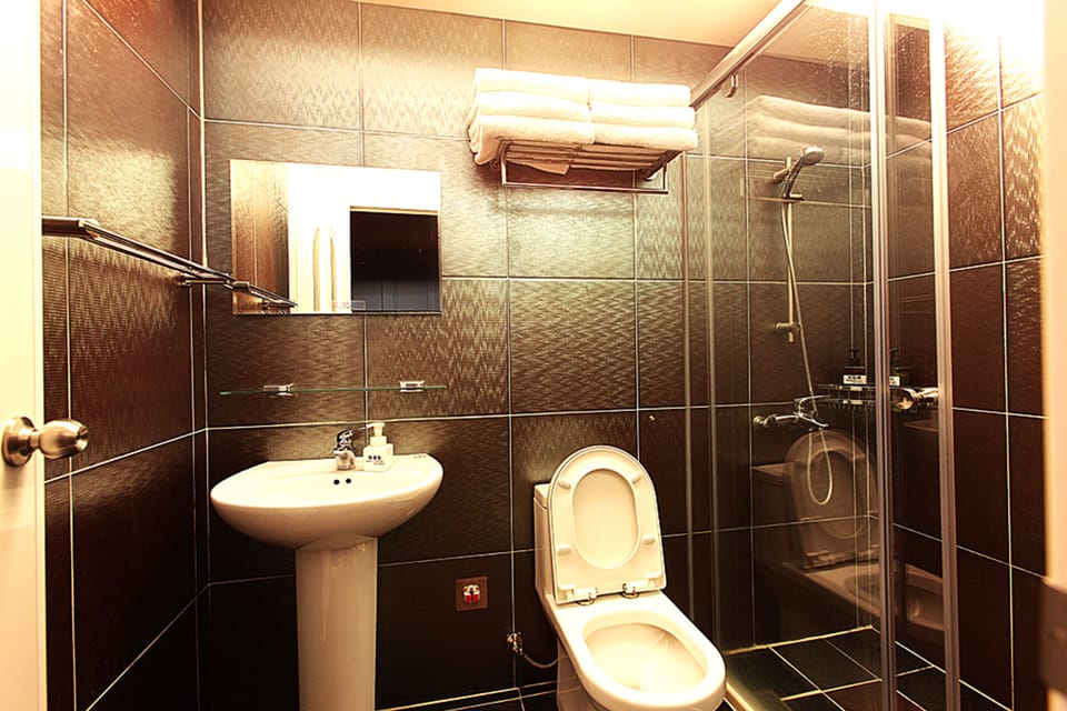 Family Room (3D Embossed) | Bathroom | Free toiletries, hair dryer, slippers, bidet