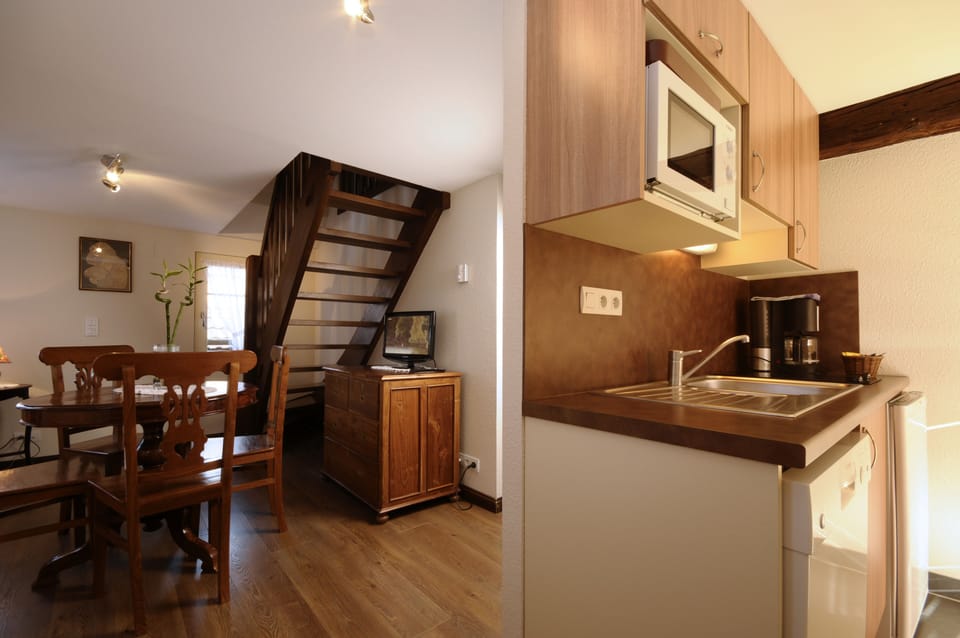 Superior Apartment | Living area | Flat-screen TV