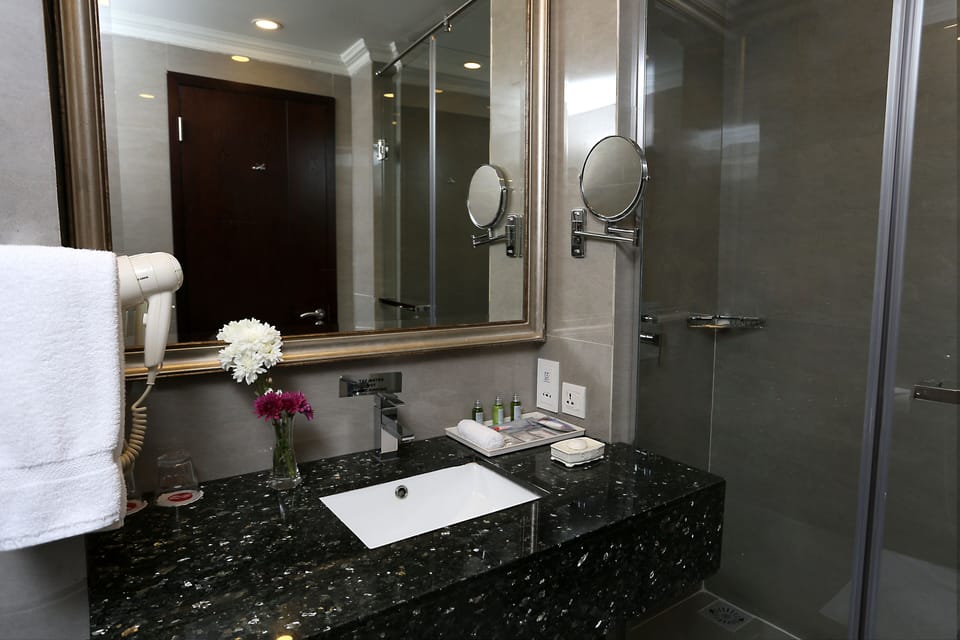 Shower, eco-friendly toiletries, hair dryer, bathrobes