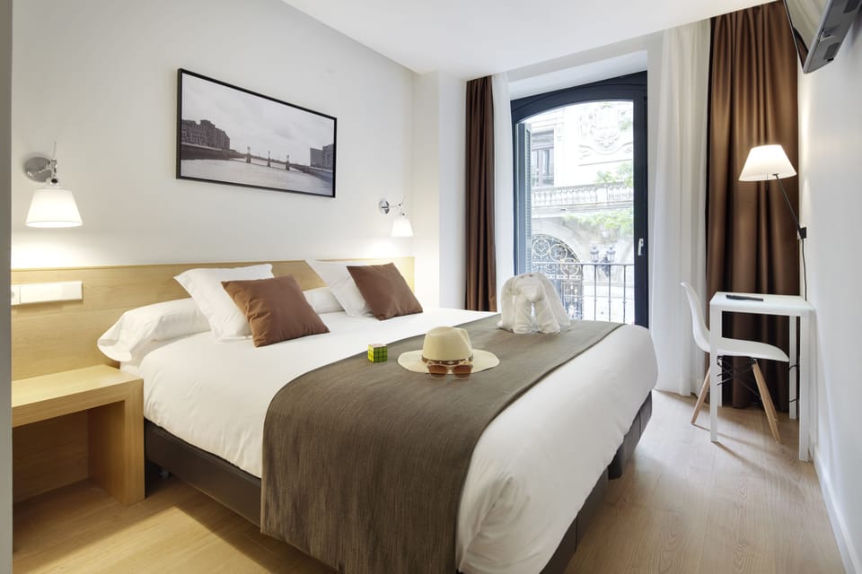 Double or Twin Room, City View | Minibar, in-room safe, soundproofing, free cribs/infant beds