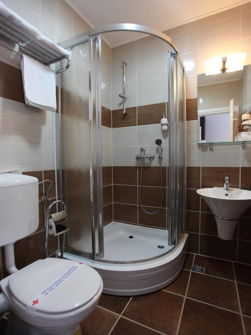 Shower, free toiletries, hair dryer, slippers
