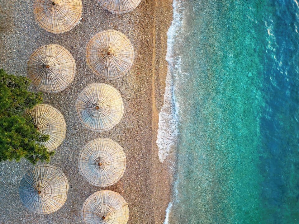 On the beach, sun loungers, beach umbrellas