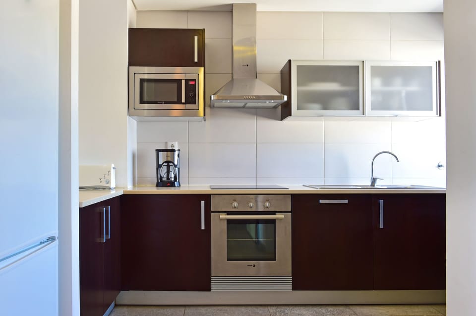 Apartment, 2 Bedrooms | Private kitchenette | Fridge, microwave, stovetop, electric kettle