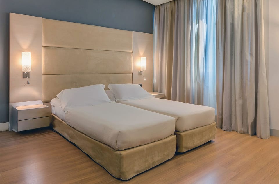 Superior Twin Room | Hypo-allergenic bedding, down comforters, minibar, in-room safe