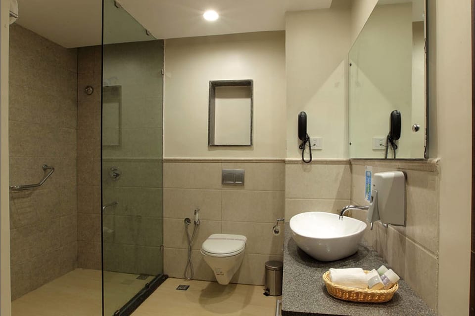 Shower, free toiletries, hair dryer, towels