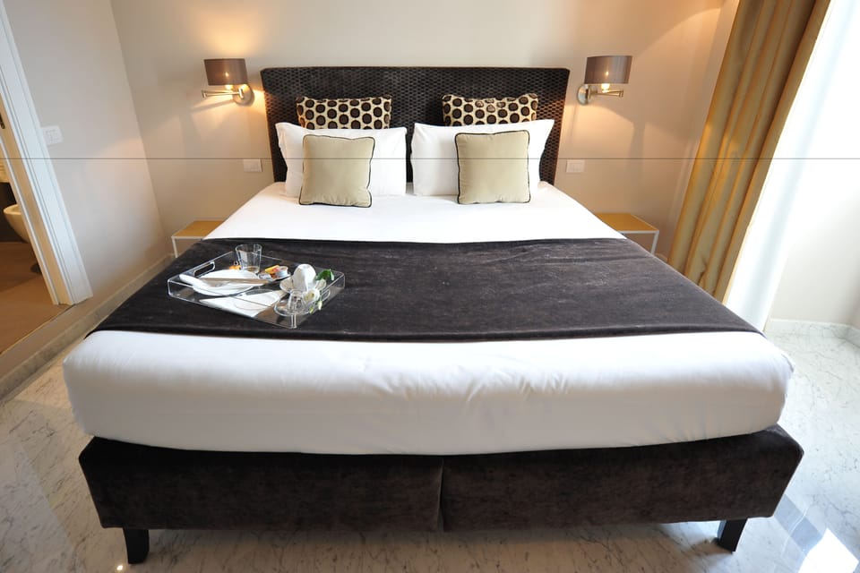 Standard Double Room, 1 Queen Bed (Piazza di Spagna) | Minibar, in-room safe, free WiFi, bed sheets