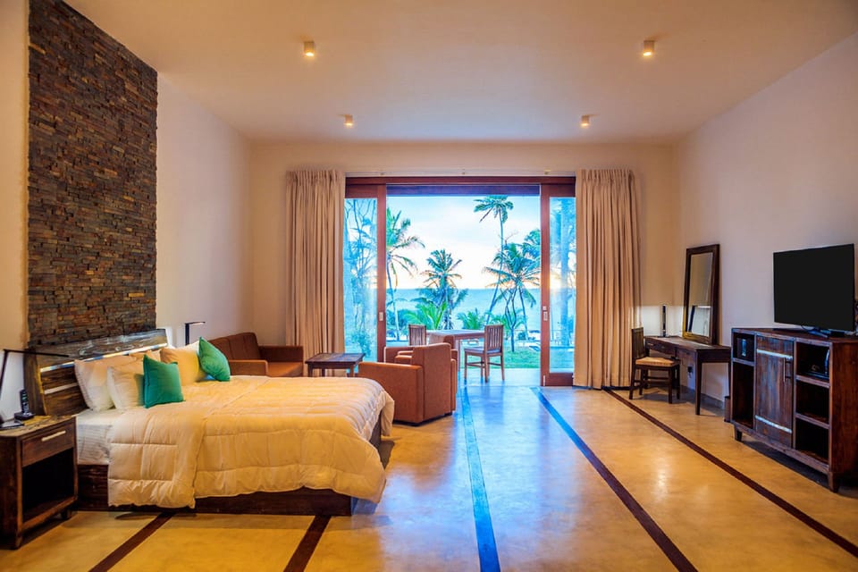 Suite with Sea View - 15% off on Spa Treatments | Premium bedding, minibar, in-room safe, desk