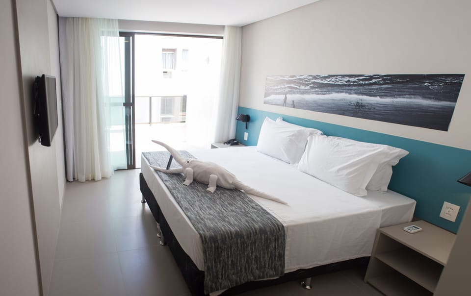 Hypo-allergenic bedding, minibar, in-room safe, blackout drapes