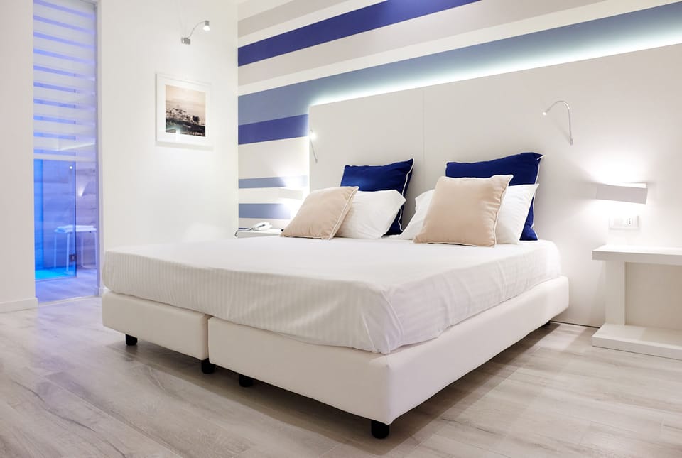 Premium bedding, down comforters, memory foam beds, desk
